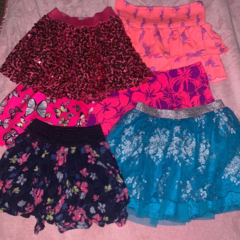 six girls skirts, gently used, from Justice
